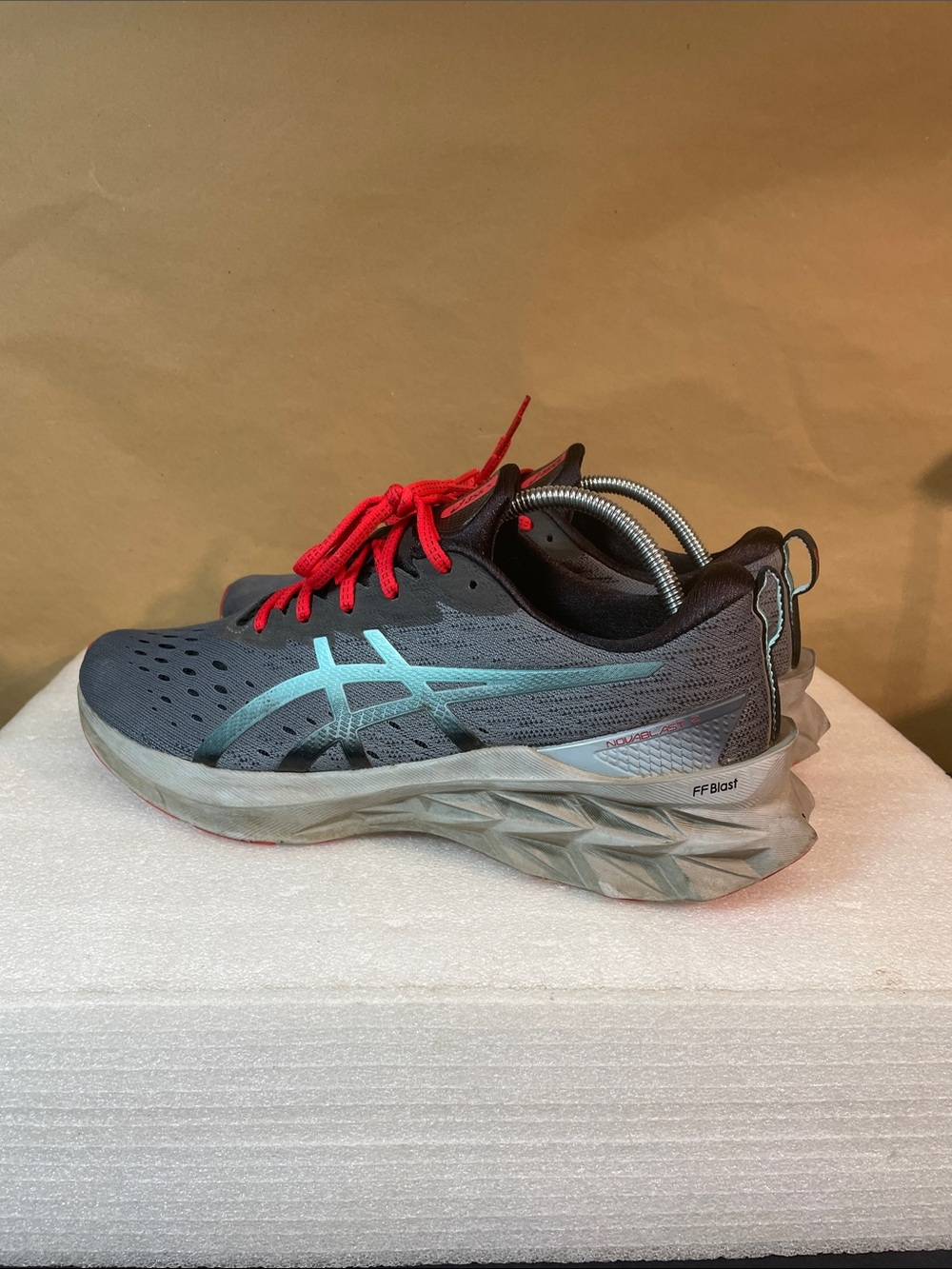 ASICS Men's Gray Running Shoes with Teal Logo and Red Laces